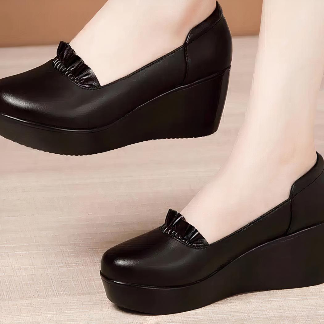 Mocassins noirs à semelles compensées pour femme