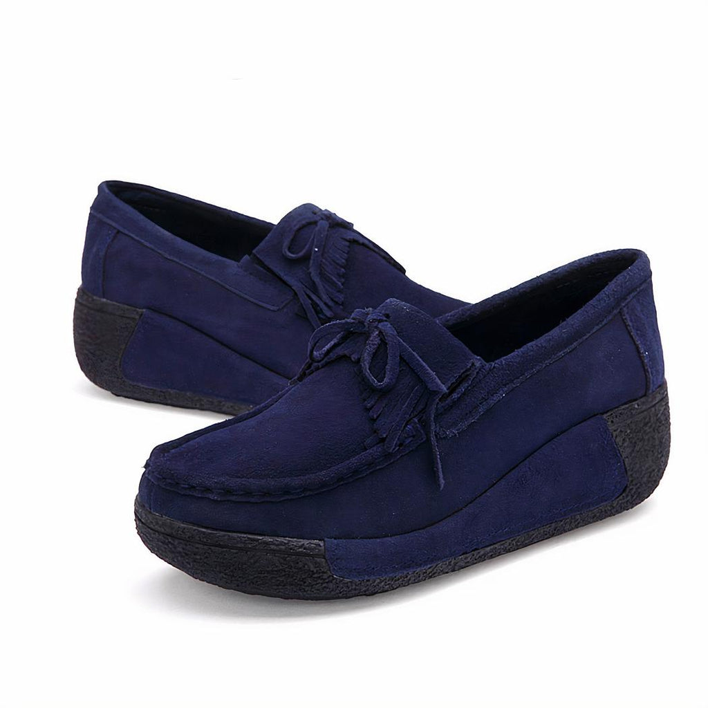 Mocassins compensés à franges en daim