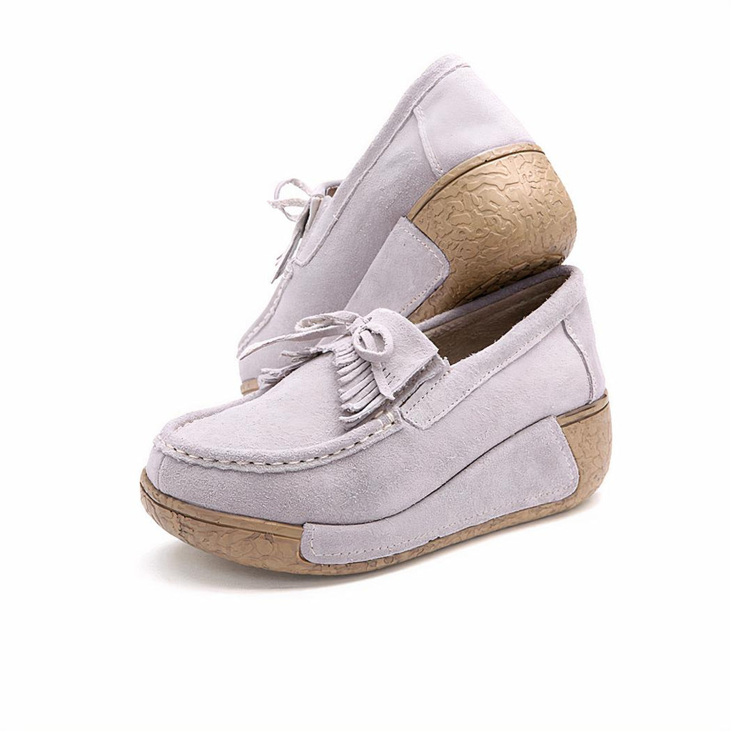 Mocassins compensés à franges en daim