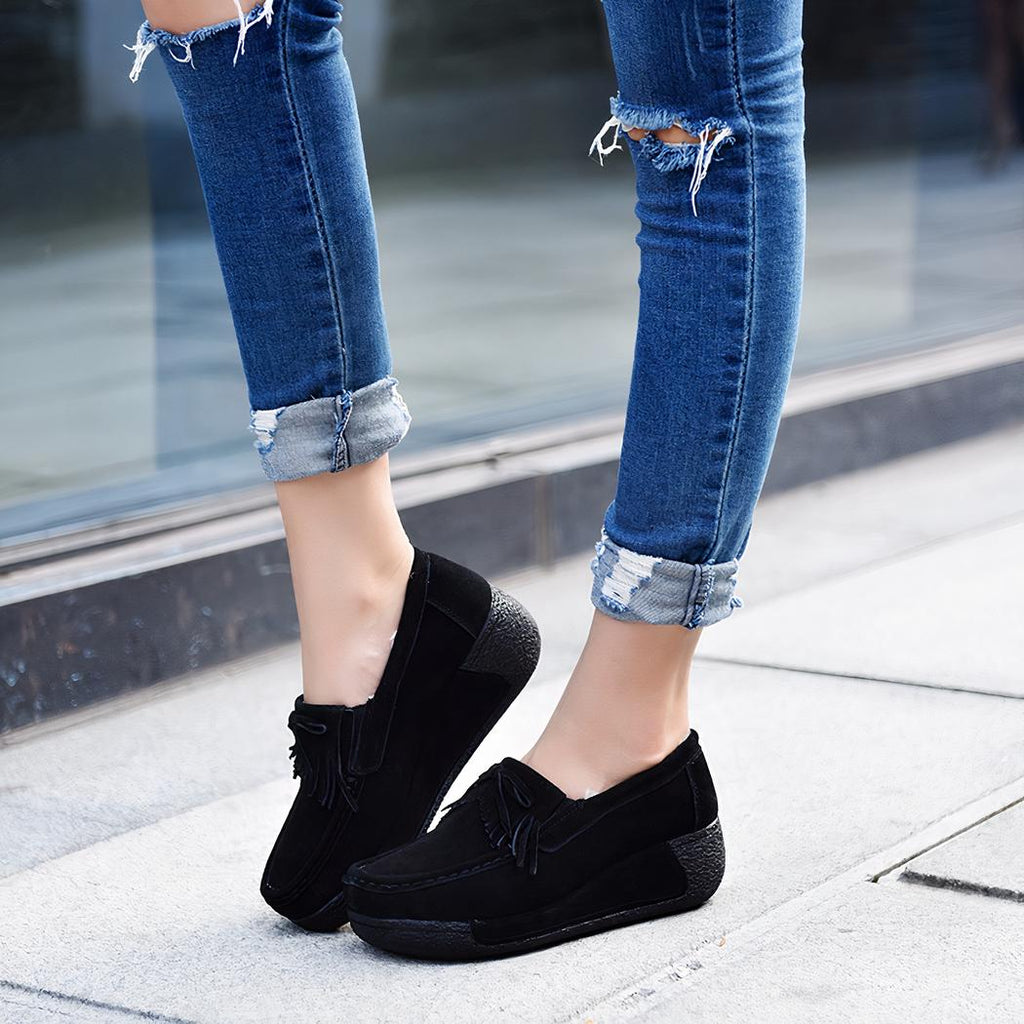 Mocassins compensés à franges en daim