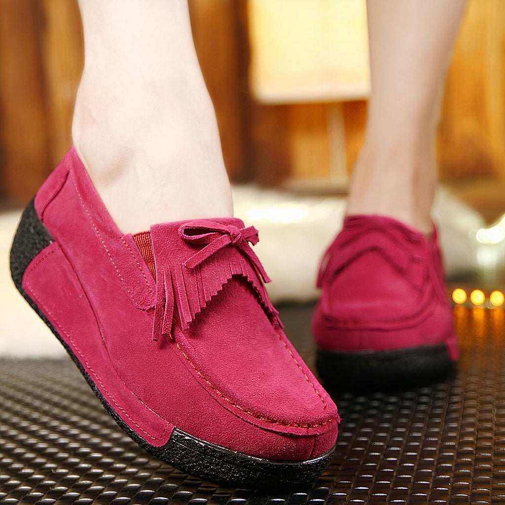 Mocassins compensés à franges en daim
