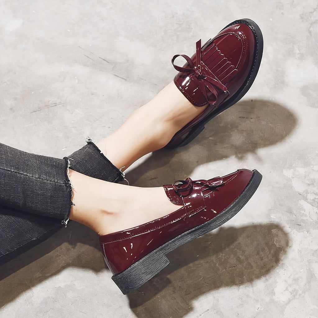mocassin rouge à gland pour femme