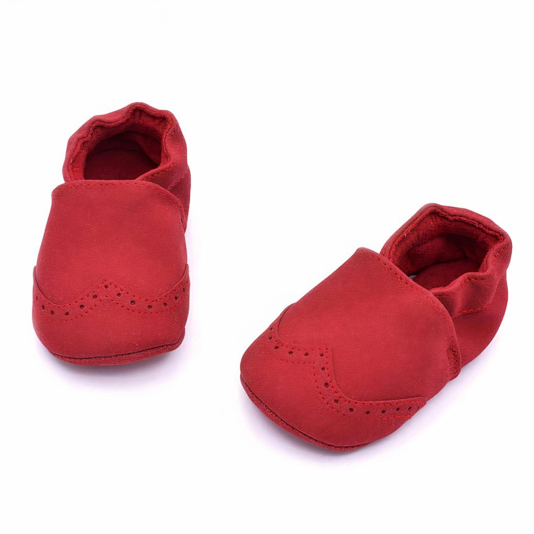 Petit mocassin en cuir pour bébé