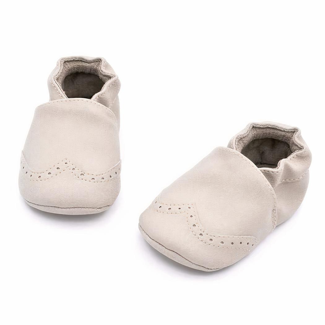 Petit mocassin en cuir pour bébé