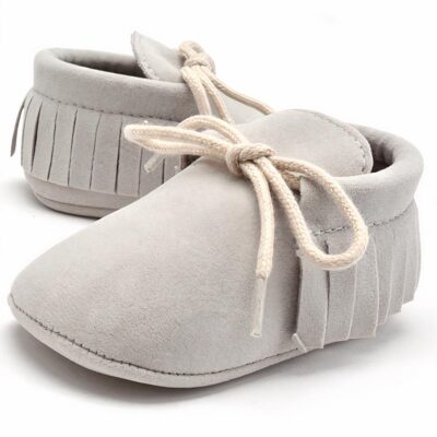 Mocassins à lacets avec des franges pour bébé