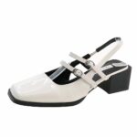 Mocassin style ballerine vernis avec deux boucles sur le dessus du pieds et une boucle au talon